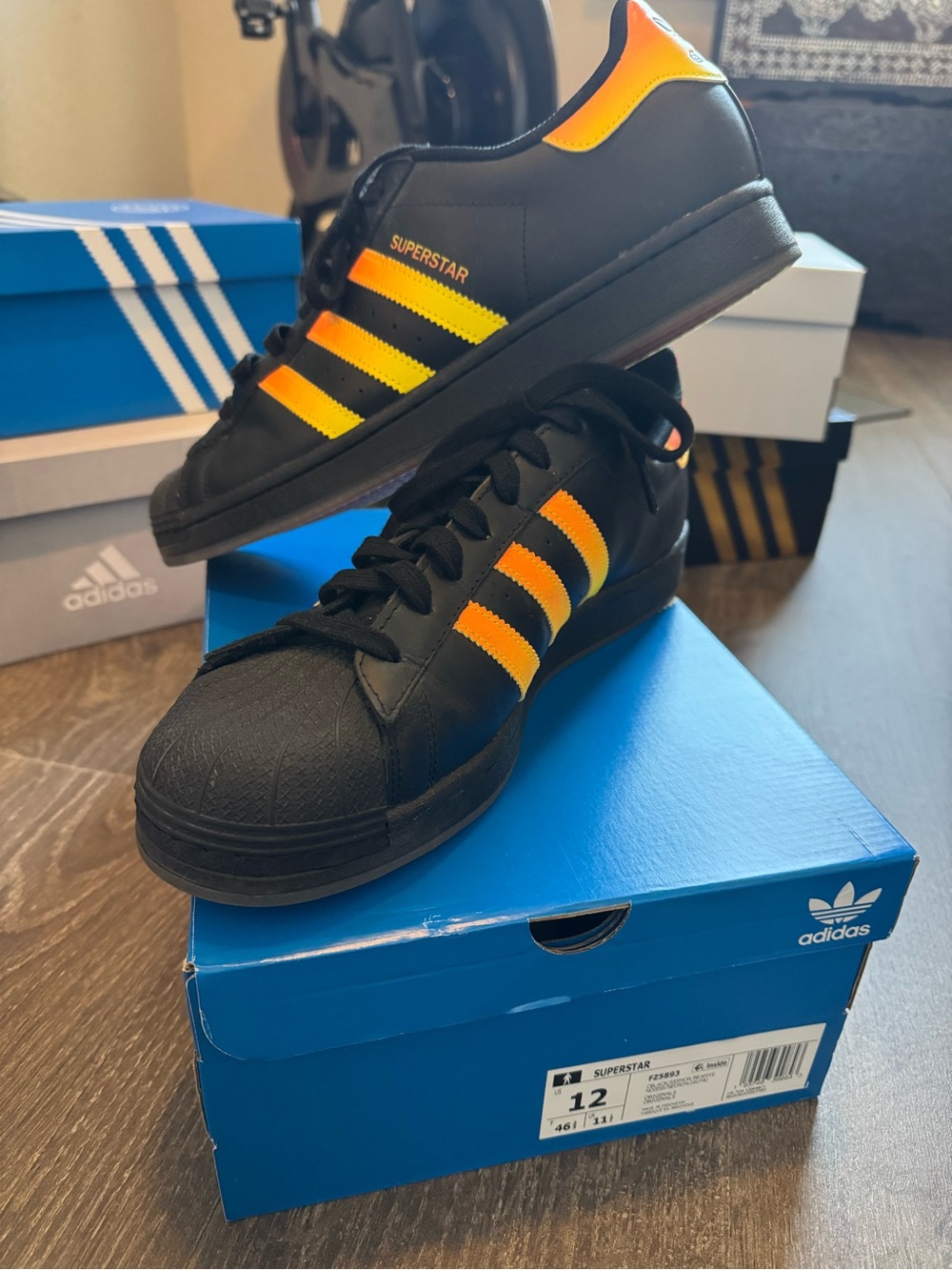 adidas Men’s Superstar Sneakers - Black with Yellow and Orange Stripes